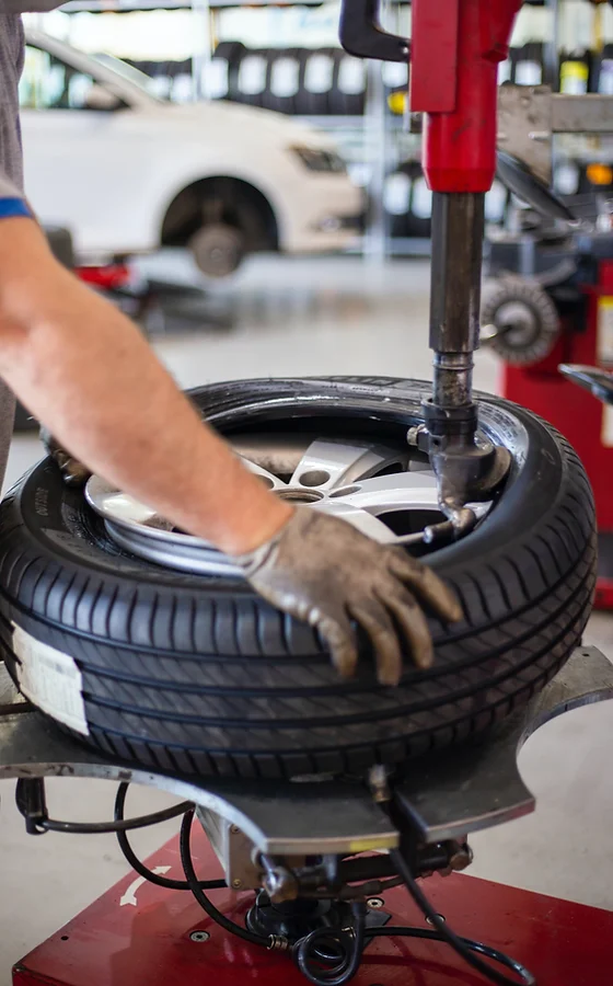 Tire repair - Changing the tire in a shop by a professional